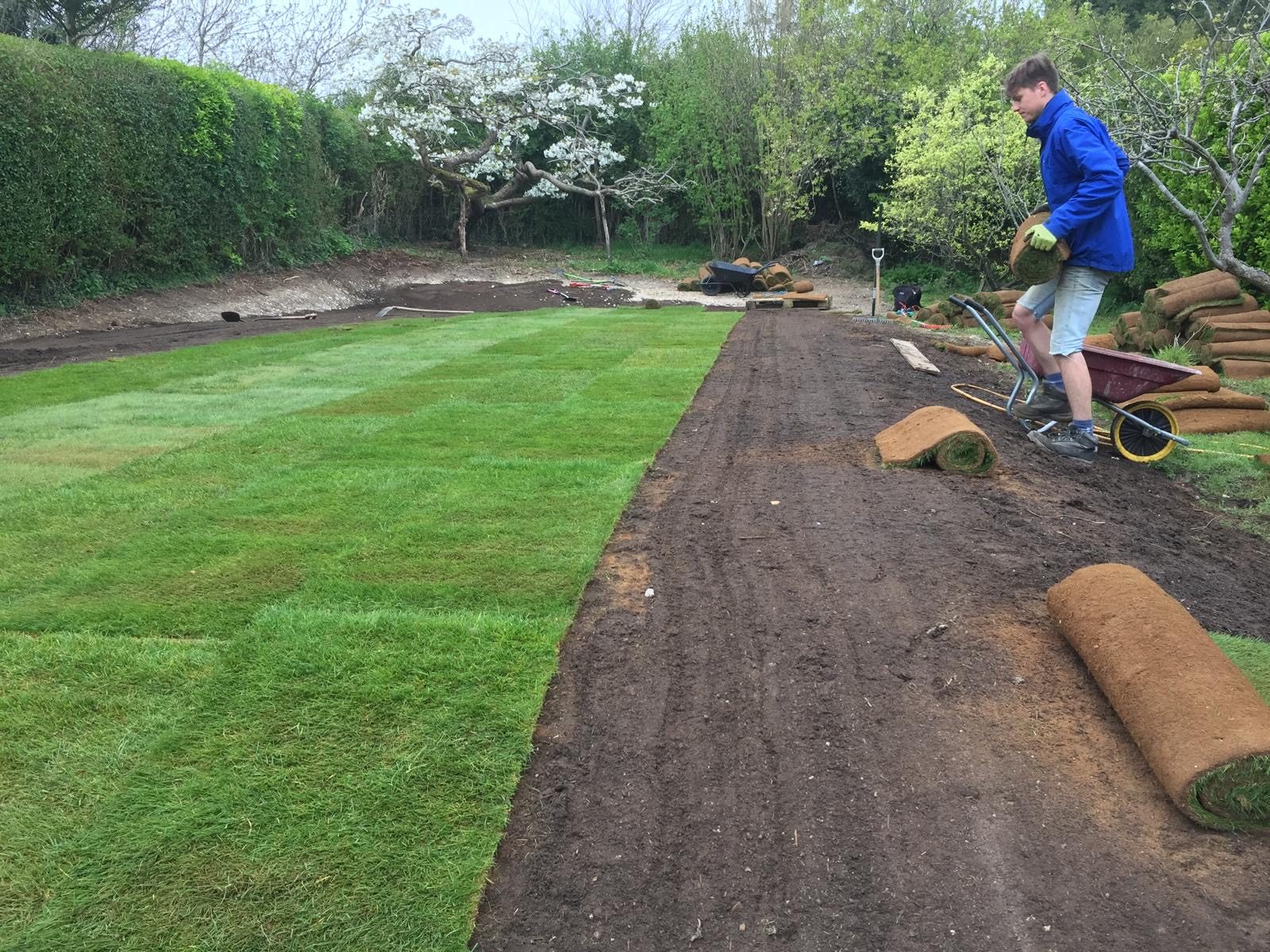 Professional turf installation in progress